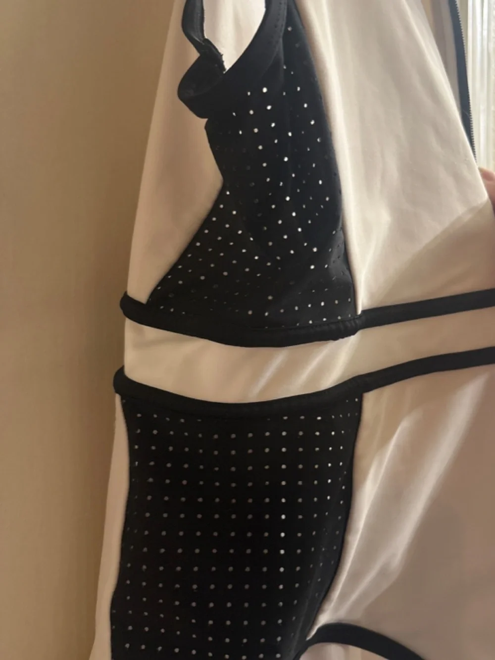 Woman’s White and Black Zip-Front One-Piece Swimsuit